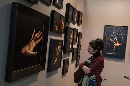 MILAN, ITALY - MARCH 10: People visit MIA, international photography and moving image art fair on MARCH 10, 2017 in Milan.のeditorial素材