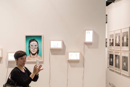 MILAN, ITALY - MARCH 10: People visit MIA, international photography and moving image art fair on MARCH 10, 2017 in Milan.のeditorial素材