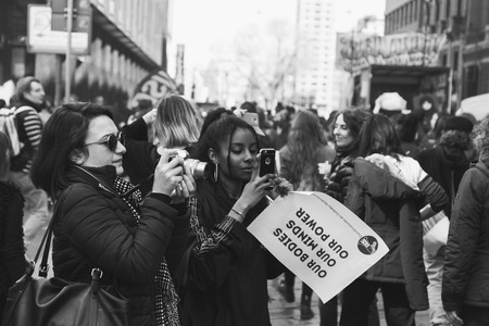 MILAN, ITALY - MARCH 8: Secondary school students take part in a march to celebrate the International Wome's Day on MARCH 8, 2017 in Milan.のeditorial素材