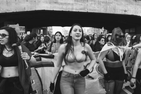 MILAN, ITALY - MARCH 8: Secondary school students take part in a march to celebrate the International Wome's Day on MARCH 8, 2017 in Milan.のeditorial素材