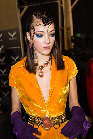 MILAN, ITALY - FEBRUARY 25: Gorgeous model poses in the backstage just before Leitmotiv show during Milan Women's Fashion Week on FEBRUARY 25, 2017 in Milan.のeditorial素材