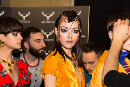 MILAN, ITALY - FEBRUARY 25: Gorgeous models pose in the backstage just before Leitmotiv show during Milan Women's Fashion Week on FEBRUARY 25, 2017 in Milan.のeditorial素材