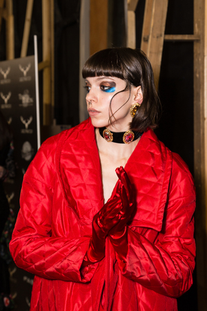 MILAN, ITALY - FEBRUARY 25: Gorgeous model poses in the backstage just before Leitmotiv show during Milan Women's Fashion Week on FEBRUARY 25, 2017 in Milan.のeditorial素材