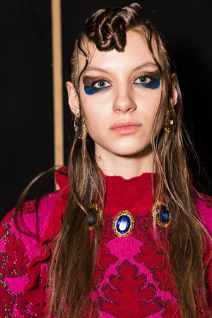 MILAN, ITALY - FEBRUARY 25: Gorgeous model poses in the backstage just before Leitmotiv show during Milan Women's Fashion Week on FEBRUARY 25, 2017 in Milan.のeditorial素材