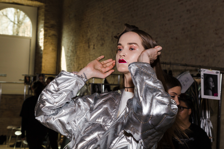 MILAN, ITALY - FEBRUARY 27: Gorgeous model poses in the backstage just before Alberto Zambelli show during Milan Women's Fashion Week on FEBRUARY 27, 2017 in Milan.のeditorial素材