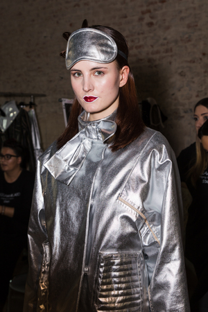 MILAN, ITALY - FEBRUARY 27: Gorgeous model poses in the backstage just before Alberto Zambelli show during Milan Women's Fashion Week on FEBRUARY 27, 2017 in Milan.のeditorial素材