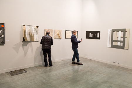 MILAN, ITALY - APRIL 1: People visit Miart, international exhibition of modern and contemporary art on APRIL 1, 2017 in Milan.のeditorial素材