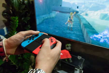 MILAN, ITALY - APRIL 7: The new Nintendo Switch on display at Fuorisalone, set of events distributed in different areas of the town during Milan Design Week on APRIL 7, 2017 in Milan.のeditorial素材