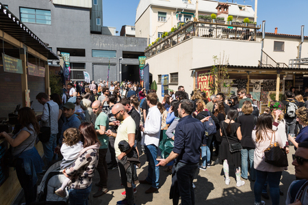 MILAN, ITALY - APRIL 8: People visit Fuorisalone, set of events distributed in different areas of the town during Milan Design Week on APRIL 8, 2017 in Milan.のeditorial素材