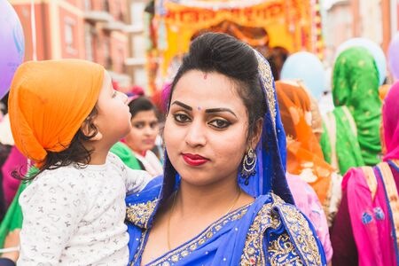 BRESCIA, ITALY - APRIL 15, 2017: Sikh woman takes part in the annual Vaisakhi parade to celebrate the first harvesting of the year and the creation of Khalsa.のeditorial素材