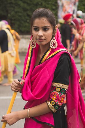 BRESCIA, ITALY - APRIL 15, 2017: Sikh woman takes part in the annual Vaisakhi parade to celebrate the first harvesting of the year and the creation of Khalsa.のeditorial素材