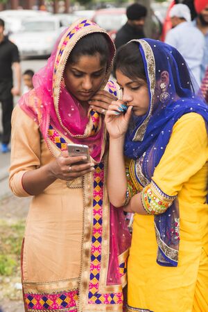 BRESCIA, ITALY - APRIL 15, 2017: Sikh women take part in the annual Vaisakhi parade to celebrate the first harvesting of the year and the creation of Khalsaのeditorial素材