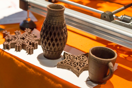 MILAN, ITALY - APRIL 21, 2017: 3d printed objects edible on display at Technology Hub, international event for innovative and futuristic technologies serving business.のeditorial素材
