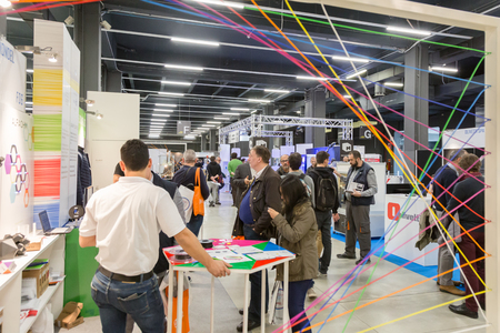 MILAN, ITALY - APRIL 21, 2017: People visit Technology Hub, international event for innovative and futuristic technologies serving business.のeditorial素材
