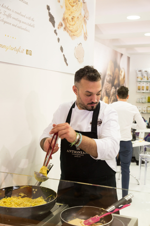 MILAN, ITALY - MAY 9: Cook works at Tuttofood, world food exhibition on MAY 9, 2017 in Milan.のeditorial素材