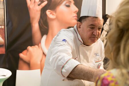 MILAN, ITALY - MAY 9: Cook works at Tuttofood, world food exhibition on MAY 9, 2017 in Milan.のeditorial素材