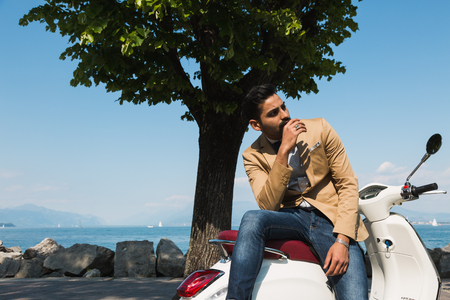 Handsome Indian man posing in a vacation context. Street fashion and style.の写真素材