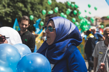 MILAN, ITALY - MAY 20, 2017: One hundred thousand people take part in a peaceful demonstration laying claim to rights and hospitality for immigrants and refugees.のeditorial素材