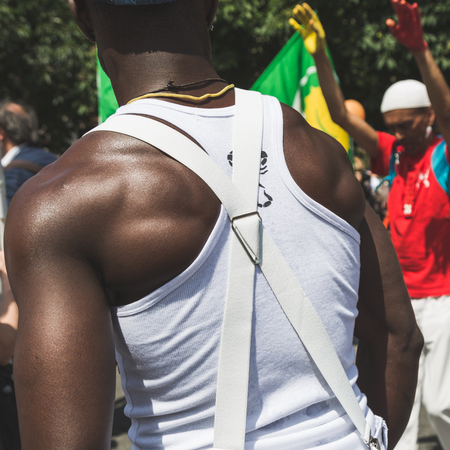 MILAN, ITALY - MAY 20, 2017: One hundred thousand people take part in a peaceful demonstration laying claim to rights and hospitality for immigrants and refugees.のeditorial素材