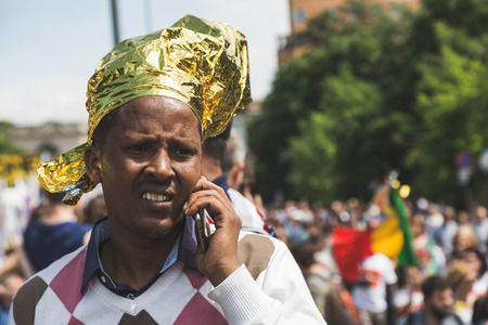 MILAN, ITALY - MAY 20, 2017: One hundred thousand people take part in a peaceful demonstration laying claim to rights and hospitality for immigrants and refugees.のeditorial素材