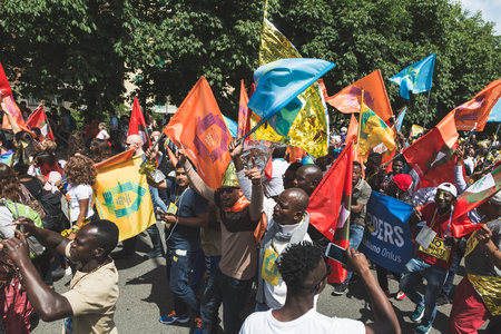 MILAN, ITALY - MAY 20, 2017: One hundred thousand people take part in a peaceful demonstration laying claim to rights and hospitality for immigrants and refugees.のeditorial素材