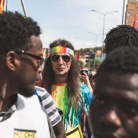 MILAN, ITALY - MAY 20, 2017: One hundred thousand people take part in a peaceful demonstration laying claim to rights and hospitality for immigrants and refugees.のeditorial素材