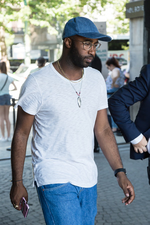 MILAN, ITALY - JUNE 17: Fashionable man poses outside Neil Barrett fashion show during Milan Men's Fashion Week on JUNE 17, 2017 in Milan.のeditorial素材