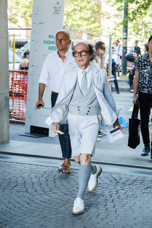 MILAN, ITALY - JUNE 17: Fashionable man poses outside Neil Barrett fashion show during Milan Men's Fashion Week on JUNE 17, 2017 in Milan.のeditorial素材