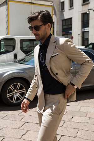 MILAN, ITALY - JUNE 18: Fashionable man poses outside Ferragamo fashion show during Milan Men's Fashion Week on JUNE 18, 2017 in Milan.のeditorial素材