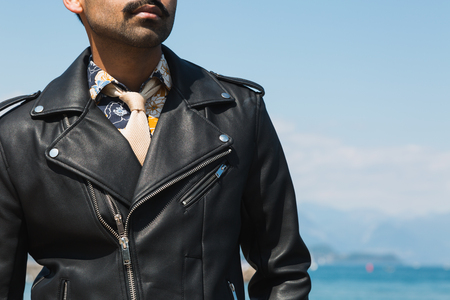 Detail of a man posing in a vacation context. Street fashion and style.の写真素材