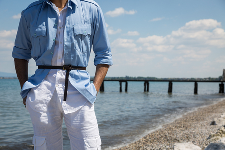 Handsome Indian man posing in a vacation context. Street fashion and style.の写真素材