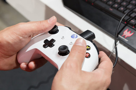 MILAN, ITALY - SEPTEMBER 29: Detail of Xbox controller at Games Week 2017, event dedicated to video games and electronic entertainment on SEPTEMBER 29, 2017 in Milan.のeditorial素材