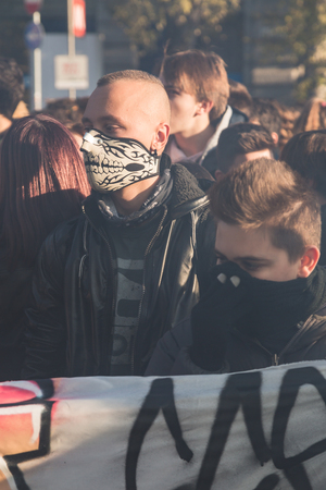 MILAN, ITALY - NOVEMBER 17, 2017: Students march in the city streets to protest against the policy of the government on the school, asking more rights and protection for their future working life.のeditorial素材