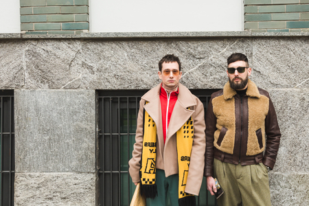 MILAN, ITALY - JANUARY 15: Fashionable people pose outside Armani fashion show during Milan Men's Fashion Week on JANUARY 15, 2018 in Milan.のeditorial素材