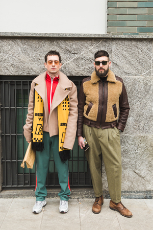 MILAN, ITALY - JANUARY 15: Fashionable people pose outside Armani fashion show during Milan Men's Fashion Week on JANUARY 15, 2018 in Milan.のeditorial素材