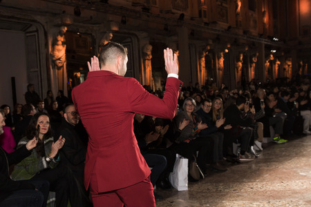 MILAN, ITALY - FEBRUARY 25: Fashion designer Salvatore Piccione thanks the audience after his show during Milan Women's Fashion Week on FEBRUARY 25, 2018 in Milan.のeditorial素材