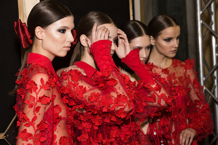 MILAN, ITALY - FEBRUARY 25: Gorgeous models pose in the backstage just before Piccione.Piccione show during Milan Women's Fashion Week on FEBRUARY 25, 2018 in Milan.のeditorial素材