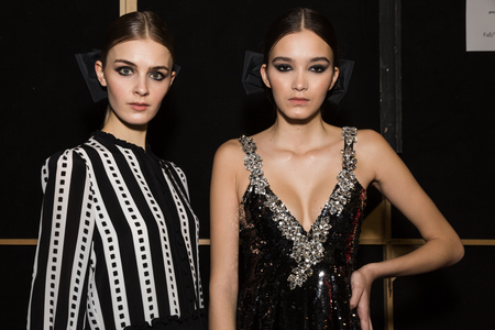 MILAN, ITALY - FEBRUARY 25: Gorgeous models pose in the backstage just before Piccione.Piccione show during Milan Women's Fashion Week on FEBRUARY 25, 2018 in Milan.のeditorial素材