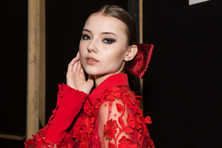 MILAN, ITALY - FEBRUARY 25: Gorgeous model poses in the backstage just before Piccione.Piccione show during Milan Women's Fashion Week on FEBRUARY 25, 2018 in Milan.のeditorial素材