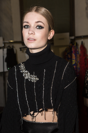 MILAN, ITALY - FEBRUARY 25: Gorgeous model poses in the backstage just before Piccione.Piccione show during Milan Women's Fashion Week on FEBRUARY 25, 2018 in Milan.のeditorial素材