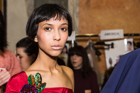 MILAN, ITALY - FEBRUARY 25: Gorgeous model poses in the backstage just before Stella Jean show during Milan Women's Fashion Week on FEBRUARY 25, 2018 in Milan.のeditorial素材