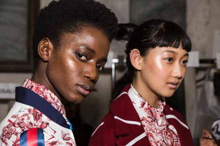 MILAN, ITALY - FEBRUARY 25: Gorgeous models pose in the backstage just before Stella Jean show during Milan Women's Fashion Week on FEBRUARY 25, 2018 in Milan.のeditorial素材