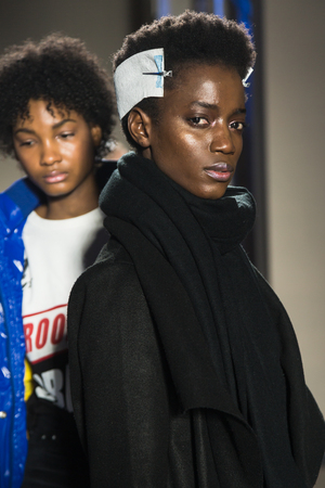 MILAN, ITALY - FEBRUARY 25: Gorgeous model poses in the backstage just before Stella Jean show during Milan Women's Fashion Week on FEBRUARY 25, 2018 in Milan.のeditorial素材
