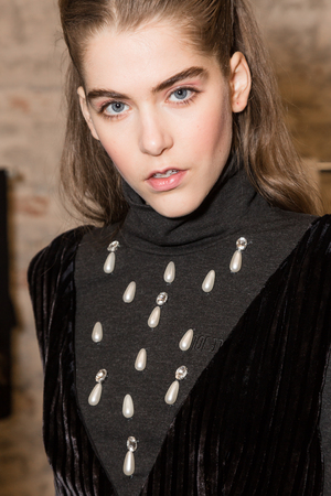 MILAN, ITALY - FEBRUARY 25: Gorgeous model poses in the backstage just before Au Jour le Jour show during Milan Women's Fashion Week on FEBRUARY 25, 2018 in Milan.のeditorial素材