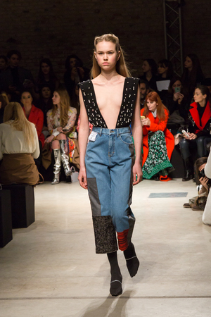 MILAN, ITALY - FEBRUARY 25: Gorgeous model walks the runway at Au Jour le Jour show during Milan Women's Fashion Week on FEBRUARY 25, 2018 in Milan.のeditorial素材