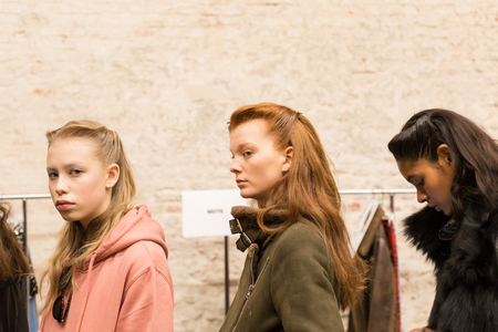 MILAN, ITALY - FEBRUARY 25: Gorgeous models pose in the backstage just before Au Jour le Jour show during Milan Women's Fashion Week on FEBRUARY 25, 2018 in Milan.のeditorial素材