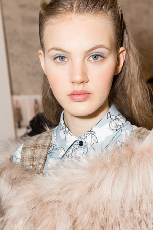 MILAN, ITALY - FEBRUARY 25: Gorgeous model poses in the backstage just before Au Jour le Jour show during Milan Women's Fashion Week on FEBRUARY 25, 2018 in Milan.のeditorial素材