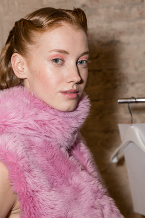 MILAN, ITALY - FEBRUARY 25: Gorgeous model poses in the backstage just before Au Jour le Jour show during Milan Women's Fashion Week on FEBRUARY 25, 2018 in Milan.のeditorial素材