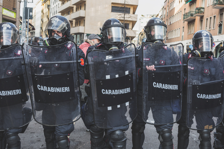 MILAN, ITALY - FEBRUARY 24: Riot policemen confront the activists during an anti-fascist march in the city streets on FEBRUARY 24, 2018 in Milan.のeditorial素材