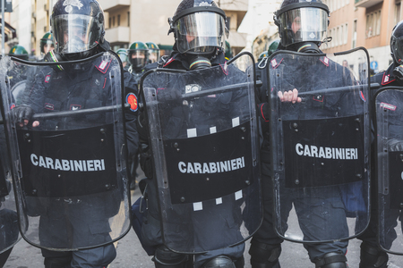 MILAN, ITALY - FEBRUARY 24: Riot policemen confront the activists during an anti-fascist march in the city streets on FEBRUARY 24, 2018 in Milan.のeditorial素材